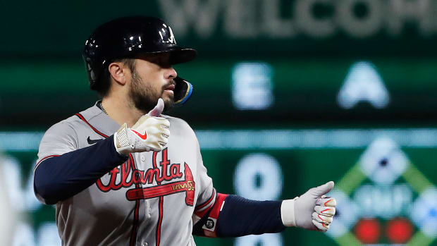Aug 8, 2023; Pittsburgh, Pennsylvania, USA; Atlanta Braves catcher Travis d'Arnaud (16) reacts at second base after hitting a double against the Pittsburgh Pirates during the ninth inning at PNC Park. Atlanta won 8-6.